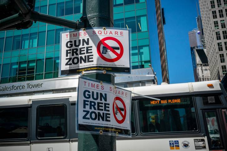 Gun free zone signs in Times Square